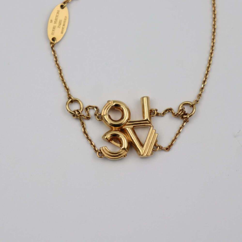 LOUIS VUITTON Gold Love Charm Bracelet - Picture 4 of 7